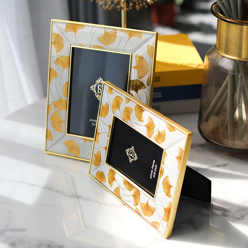 
Light luxury simple glass inkjet photo frame 6 inch 7 inch gold ginkgo leaf home decoration frame decoration 