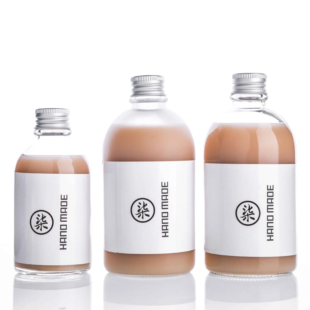 wholesale transparent frosted 150ml 250ml 350ml beverage juice coffee glass bottles with screw lid
