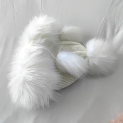 The factory supplies artificial wool cold-proof noble hair ball warm children knitted hat