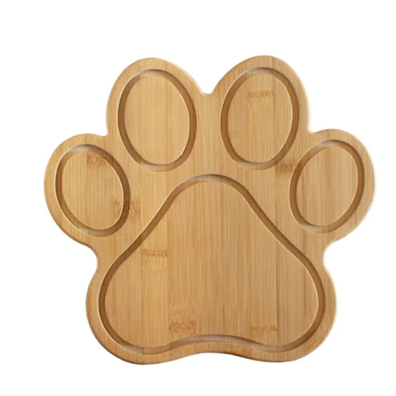 Claw-shaped bamboo serving and cutting board with juice trough