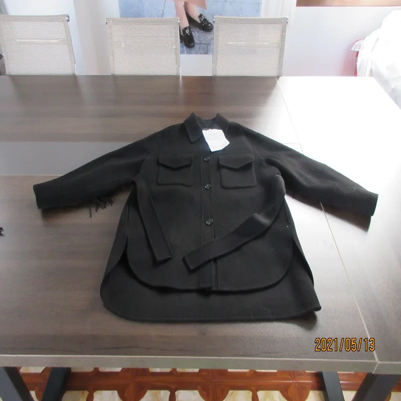 Служба контроля качества женского пальто