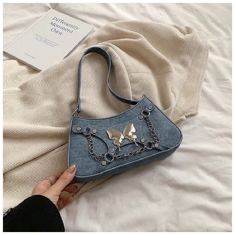 2024 best-selling wholesale mini exquisite bow chain handbag motorcycle street photo women shoulder saddle bag sweet cool style