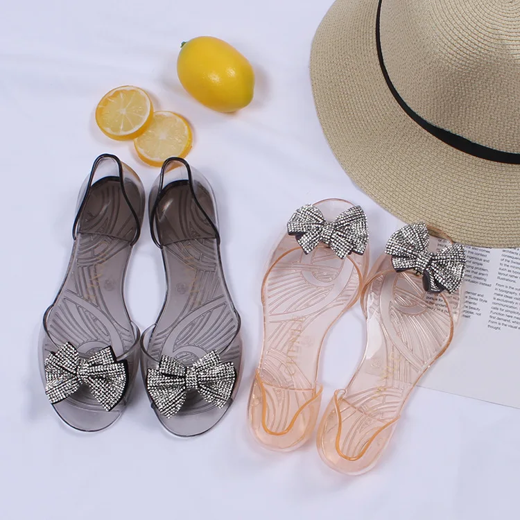 
Professional design crystal fish mouth transparent flat shoes latest rhinestone soft bow Jelly sandals for women and ladies 