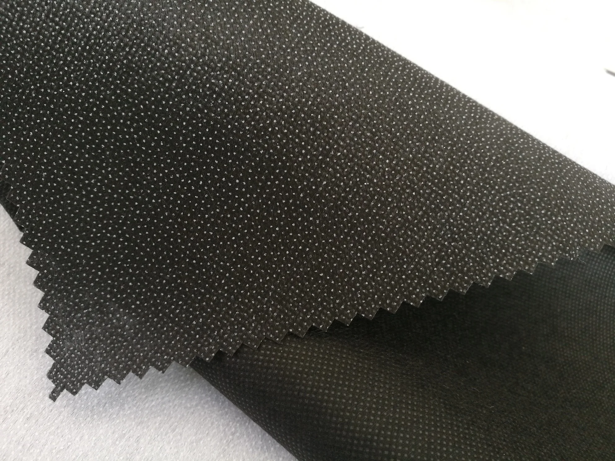 
100 Polyester reinforced stitch bond Interlining fusing brushed nonwoven buckram fabric 