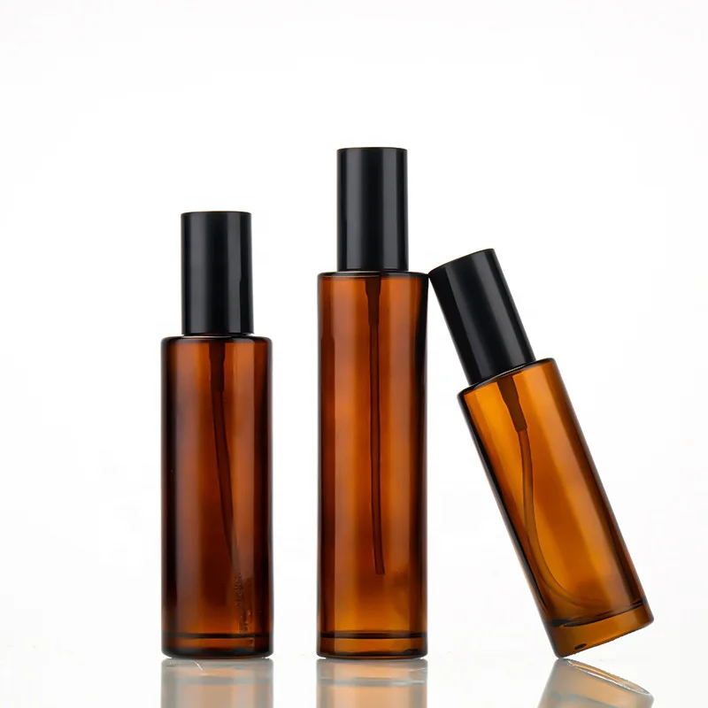 Unique custom cosmetic glass pump bottle amber color lotion spray glass bottle with pump