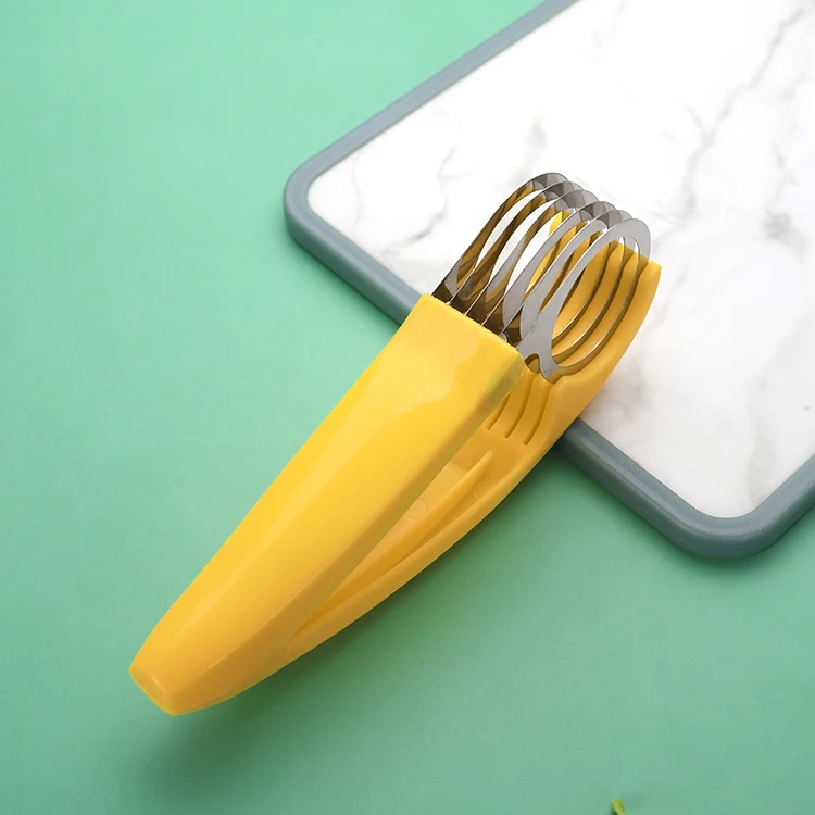 Fruit and vegetable salad peeler cutter kitchen equipment for bananas in stainless steel with a plastic grip