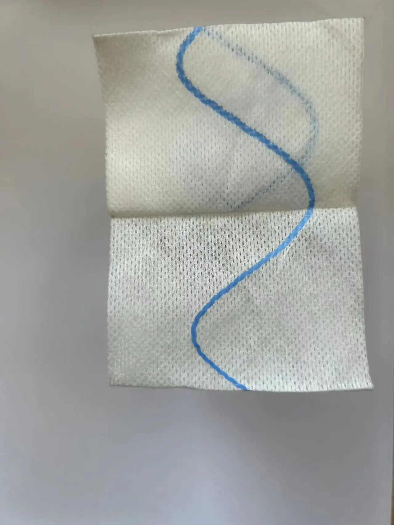Z-folded gauze with coagulant factor
