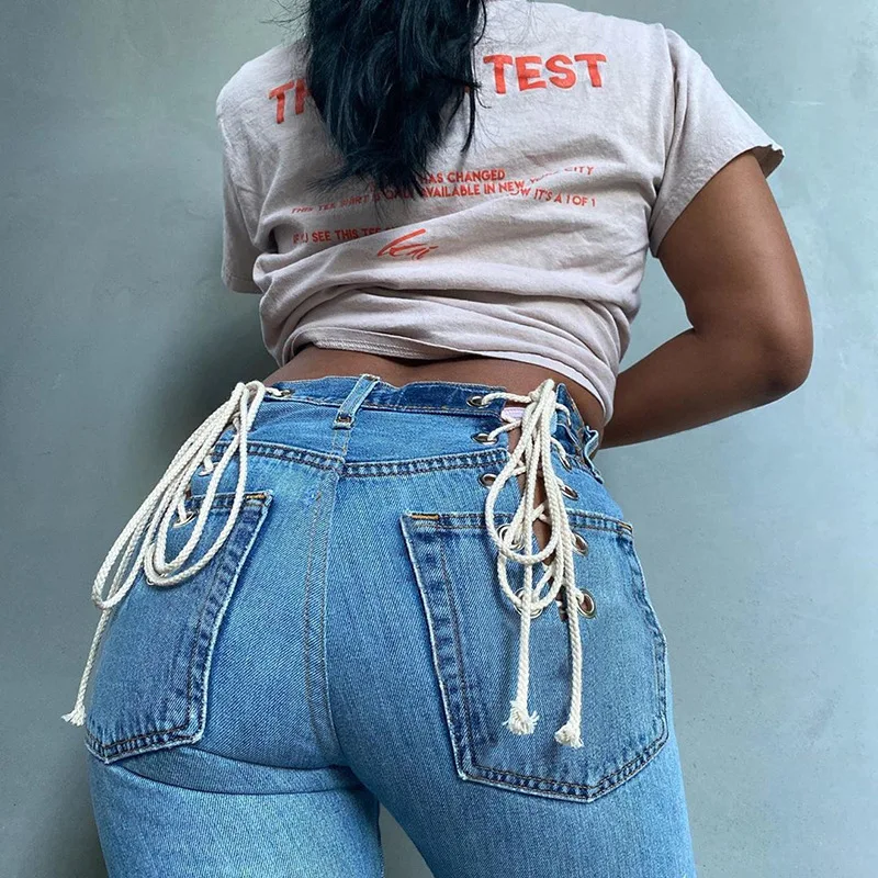 
Hot sales blue long jeans outfits women Manufacture hollow strap lady legging jeans Creative back contrast eyelet denim pants 