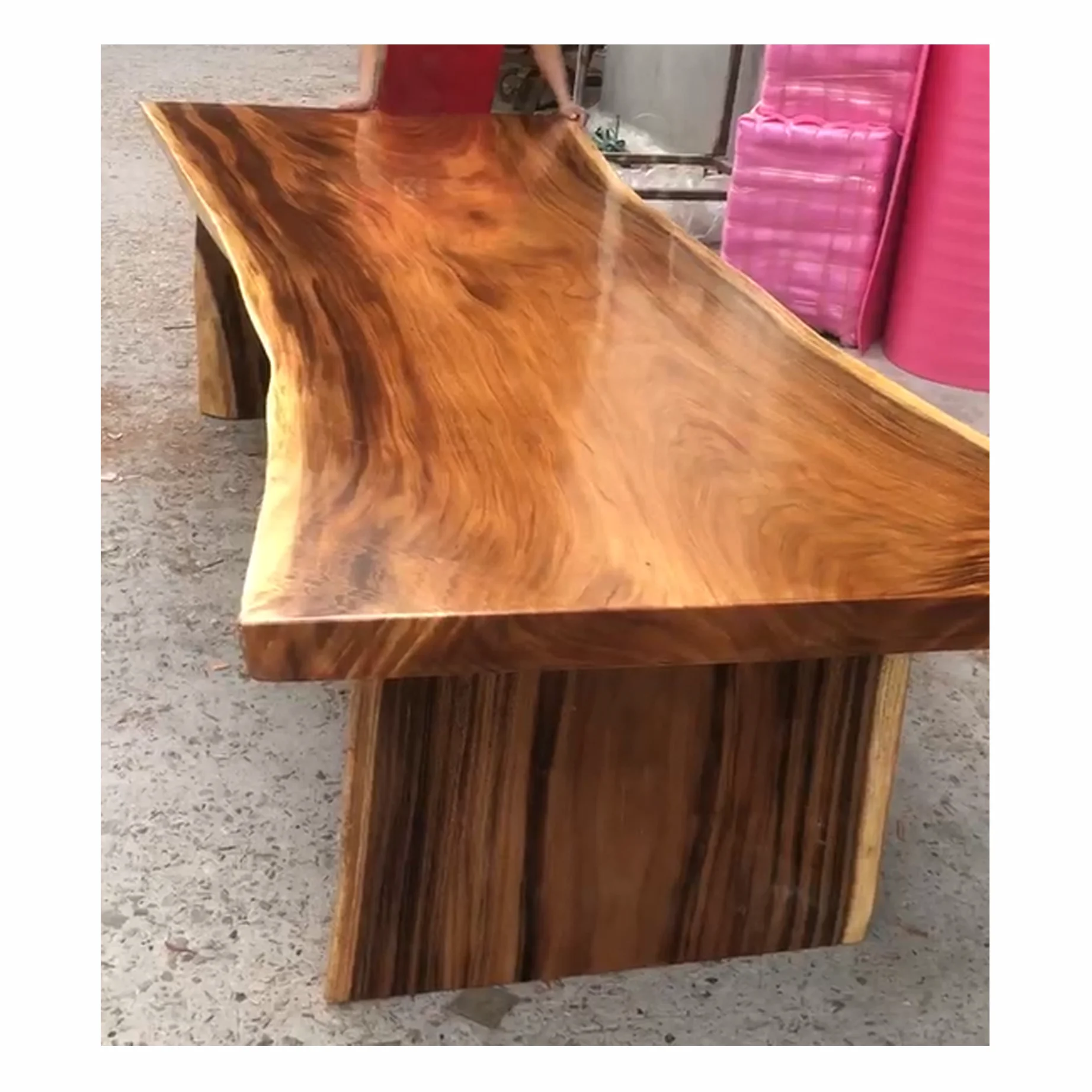 Custom made live edge dining table with same stable wooden table base