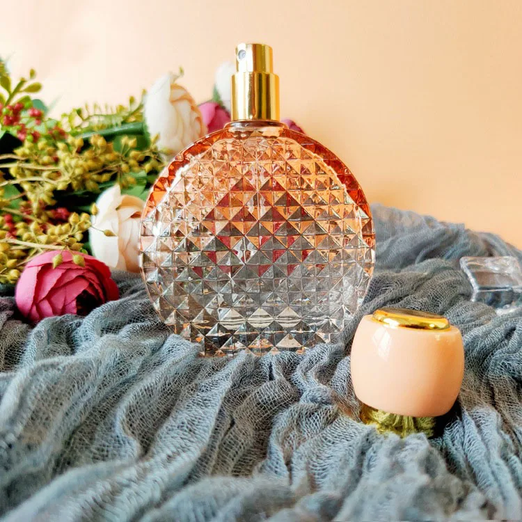 guangzhou high quality free sample glass flat round gradient bottle with pump for supplier malaysia