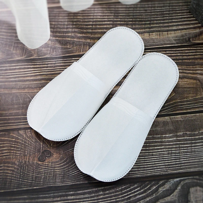 Wholesale cheap price non-woven fabric disposable slippers eco friendly sole spa and hotel slippers