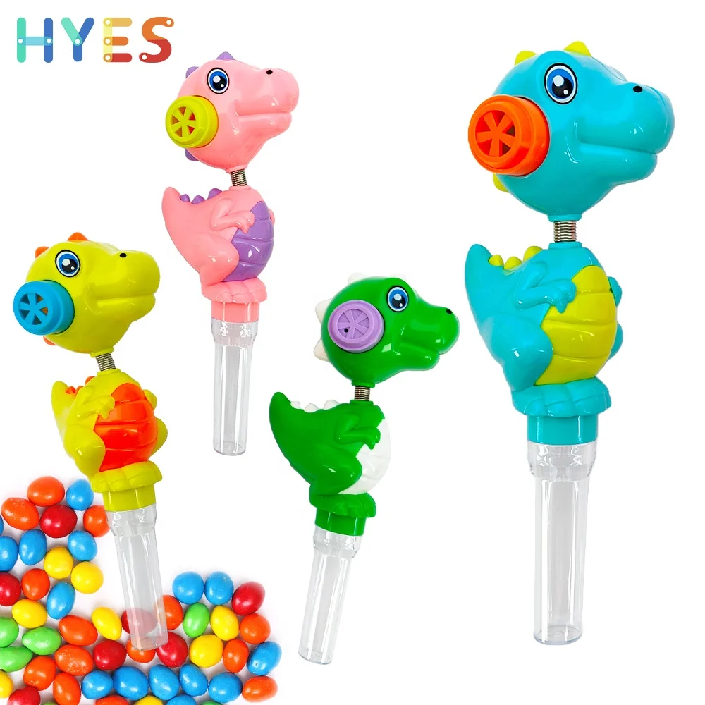 Huiye Hot Sales 2 In 1 Candy Toys Mini Handheld Dinosaur Shape Wand With Sounds Indoor Outdoor Portable Candy Toys For Children