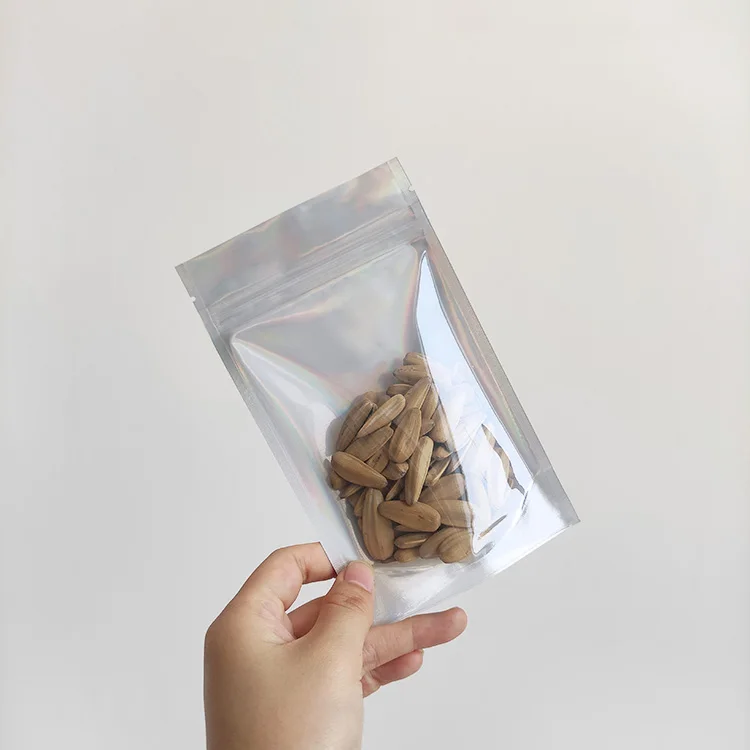 15x22 cm Custom Laser Film Packing One Side Clear Stand Up Pouch Holographic Cosmetic Bag