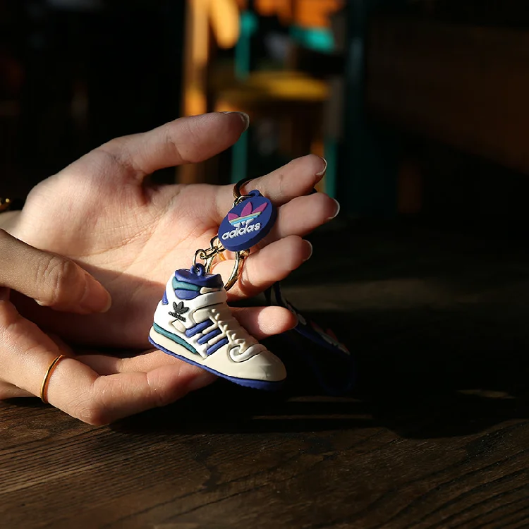 Wholesale Cartoon Creative Trend Ad Artificial Pendant Sports Sneakers Keychain Push Opening Small Gift