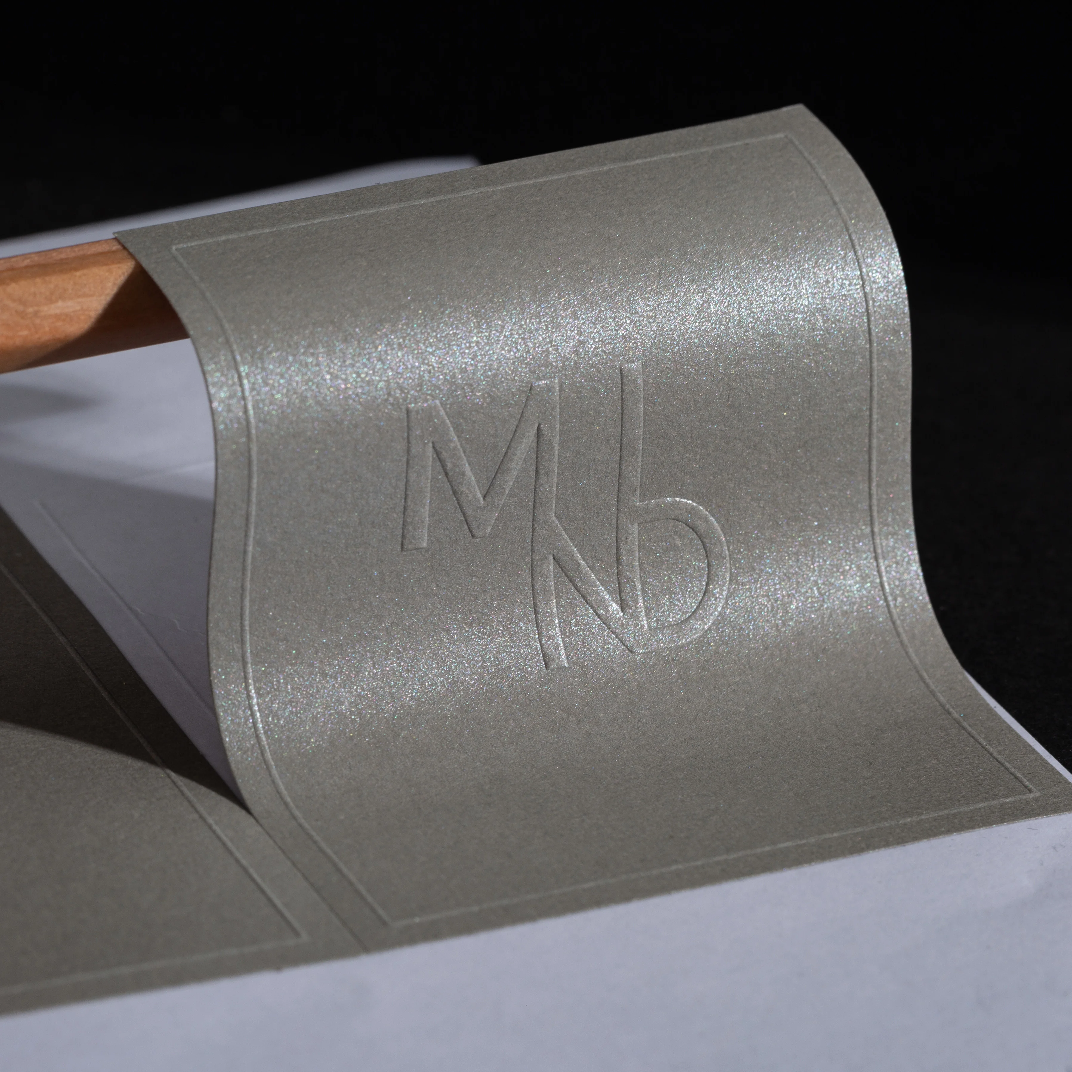 Factory luxury customized gray texture paper sticker 3d embossed logo self adhesive candle perfume labels