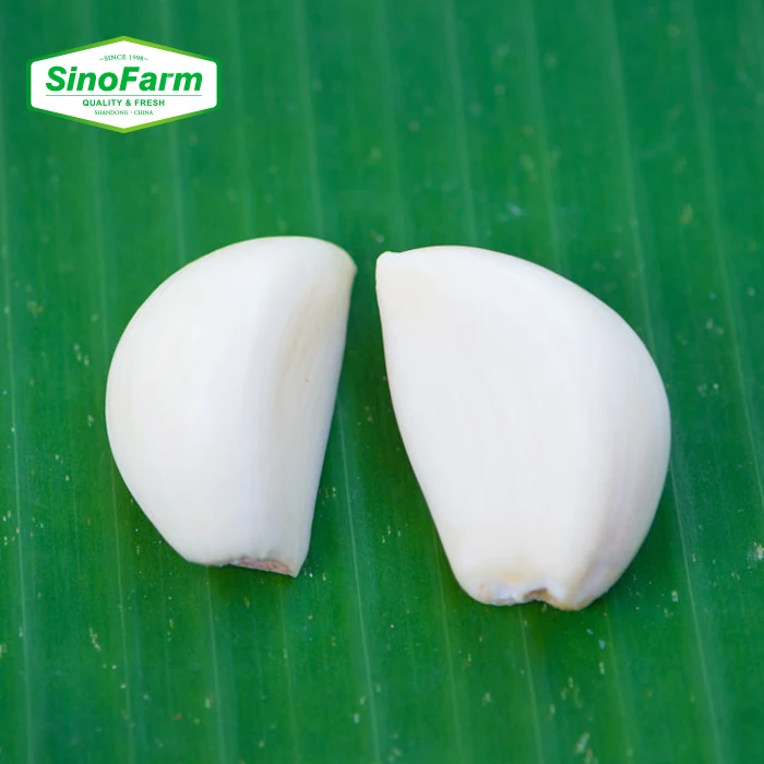 Свежие очищенные чесночные гвоздики оптом