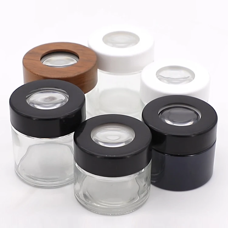 Custom 2oz 3oz 4oz child resistant glass container clear magnifying smell proof glass jar with magnifying lid