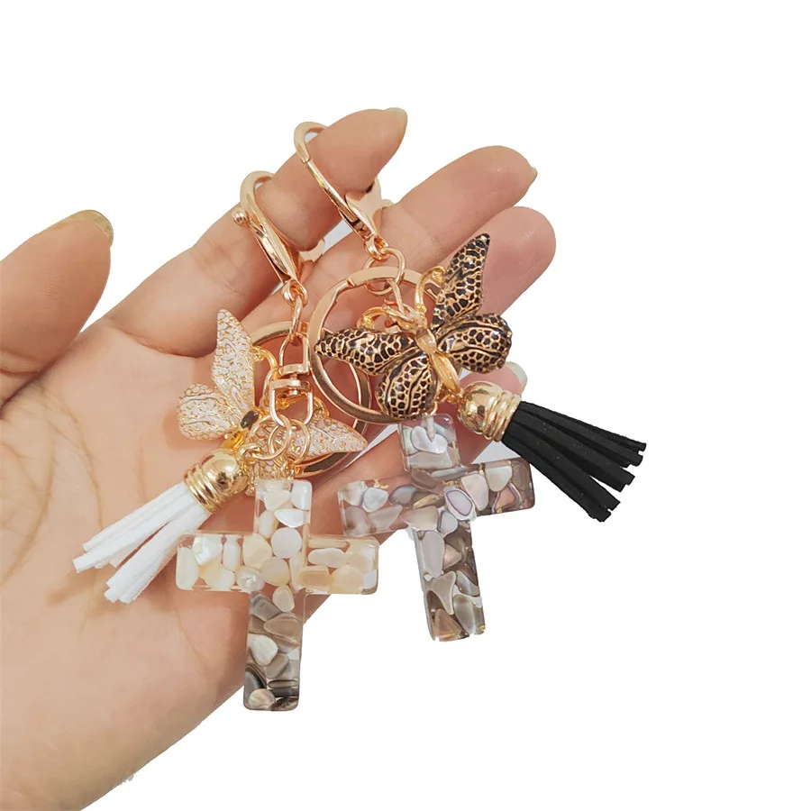 Wholesale Colorful Butterfly Glitter Resin Keychain Tassel Charms Bag Car Pendant Acrylic Butterfly Cross Key Chains
