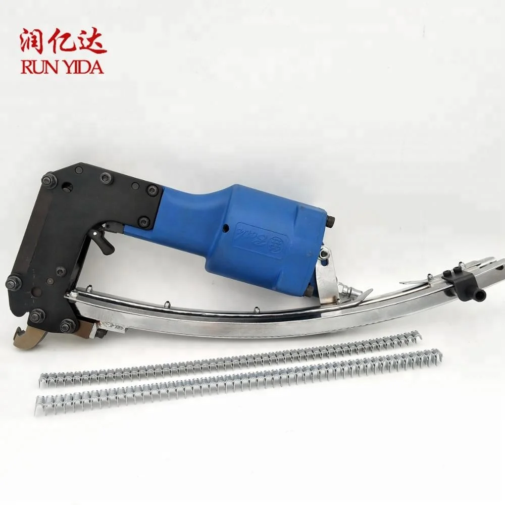 There is a stock M66 series mattress bed spring production fully automatic mattress riveting tool gun