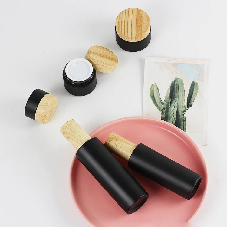 Matte black coating face cream jar skincare containers 20g 30g 50g cosmetic packaging cream jars with bamboo grain lid glass jar