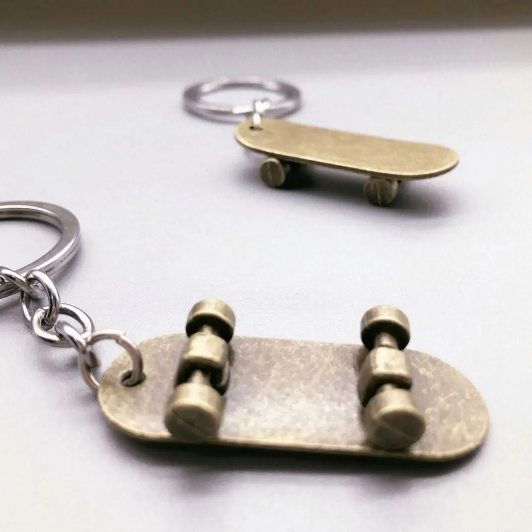 Cute Mini Skateboard Keychain Women Men Interesting Simulation Scooter Car Keychain Key Ring For Skate Lovers Souvenir Gifts