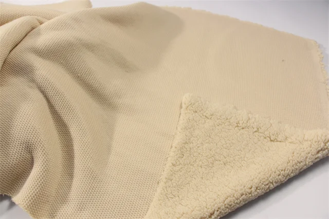 Hot sale solid color lamb wool fabric high quality polyester coral velvet fabric for clothing