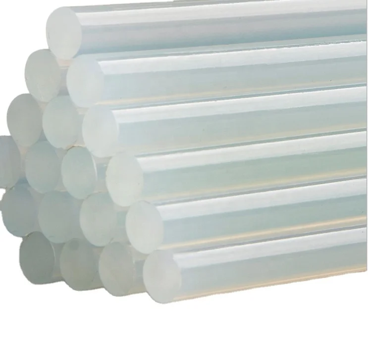 Прозрачные стержни термоклеевого пистолета для склеивания бумаги