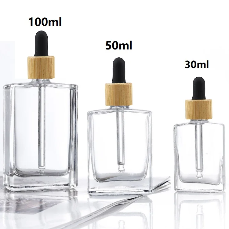 Popular empty clear flat square rectangle 1oz 30 ml Cosmetic  Glass Dropper oil Serum Bottle 30ml with Bamboo Cap