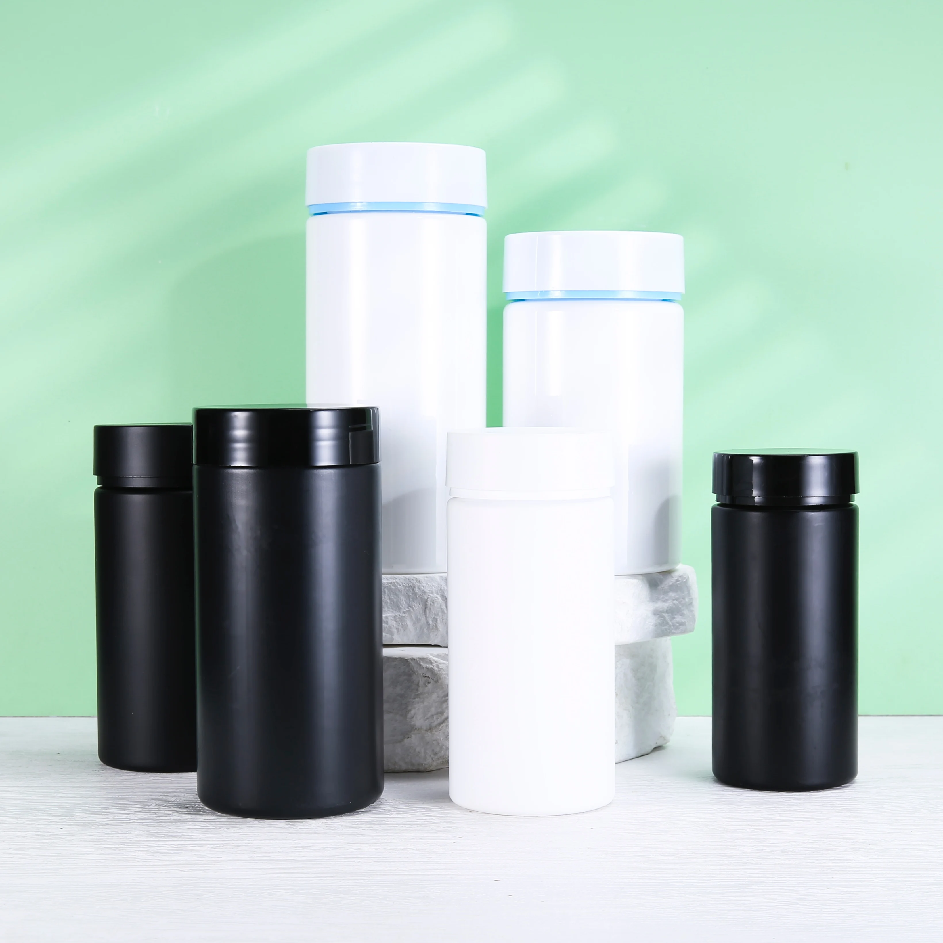 Customized color black white flat shoulder plastic bottle with for capsules medicine vitamin manufacturing empty packaging