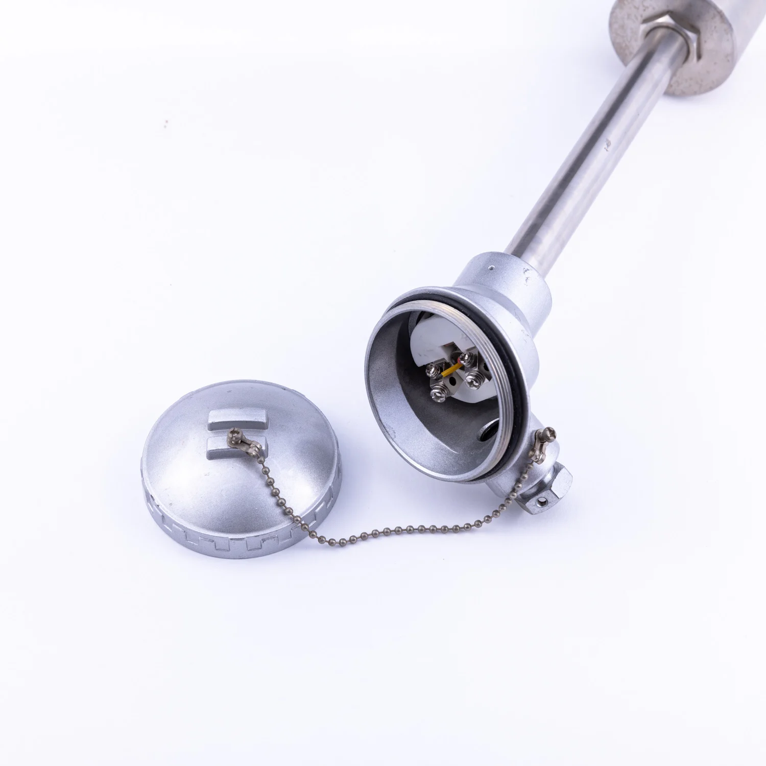 Mineral insulated RTD sensor with thermowell  Thermocouple consists of two wires, each made of different metal, welded together