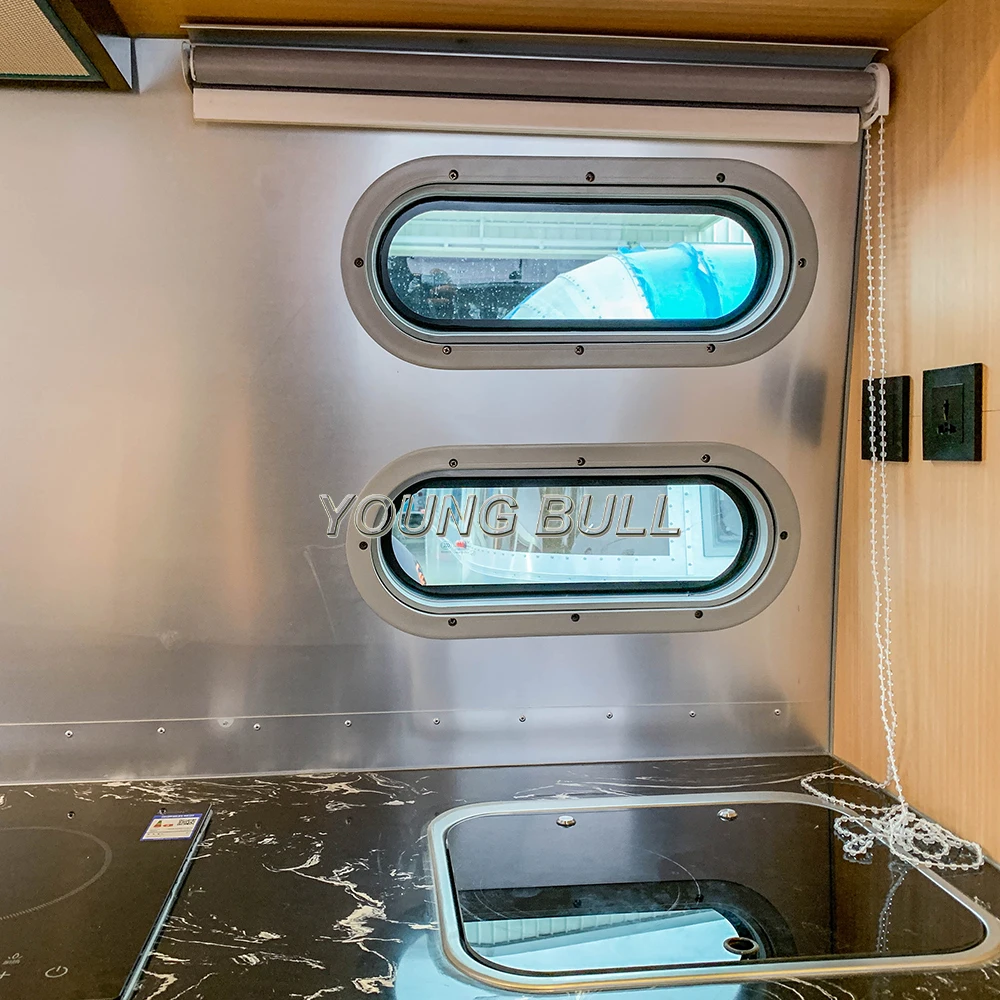 electric camper van aluminum over fender parts of vertical slide out camp kitchen off road caravan