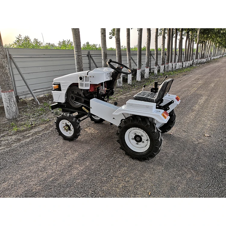Chinese cheap mini farm tractor 12hp with tiller, plow, snow blade