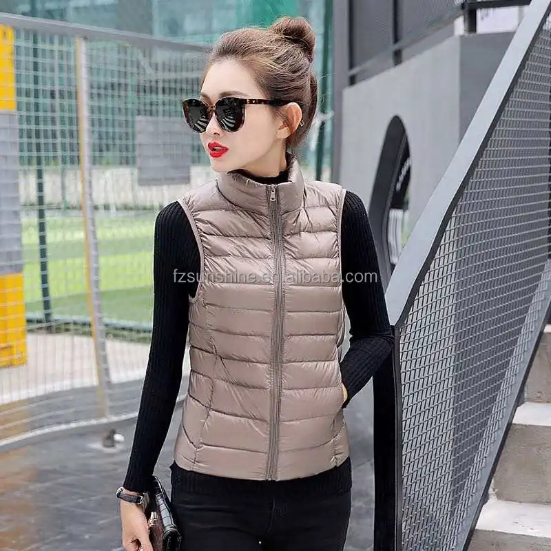 Женский жилет на утином пуху