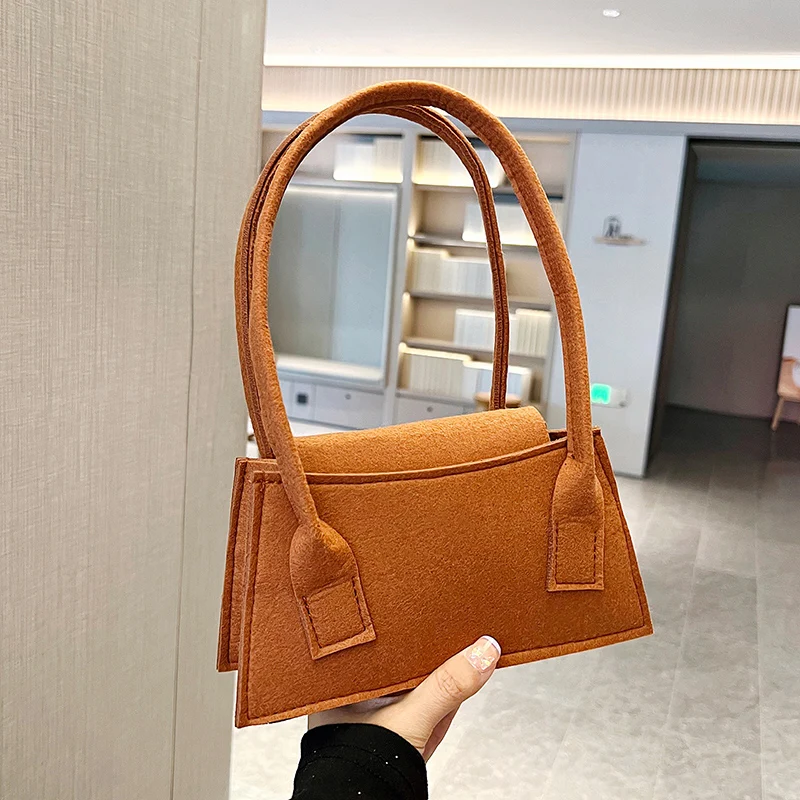 2023 new arrivals yiwu market products felt cloth bags China wholesale Fashion luxury handbag for women cheap flap dust bag