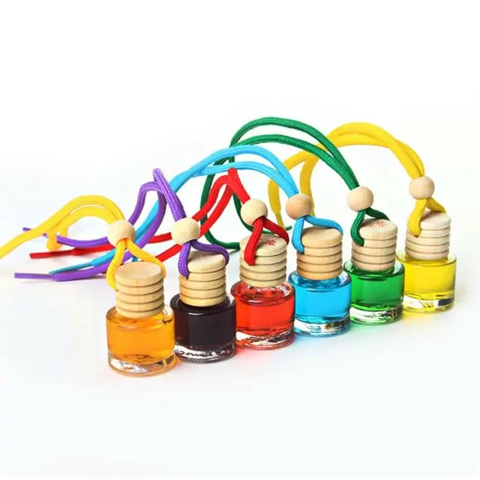 Manufacturer of Mini Cylindrical Shaped 5ml 10ml Hanging Car Air Freshener Car Perfume Diffuser Bottle with Wood Cap and Clip