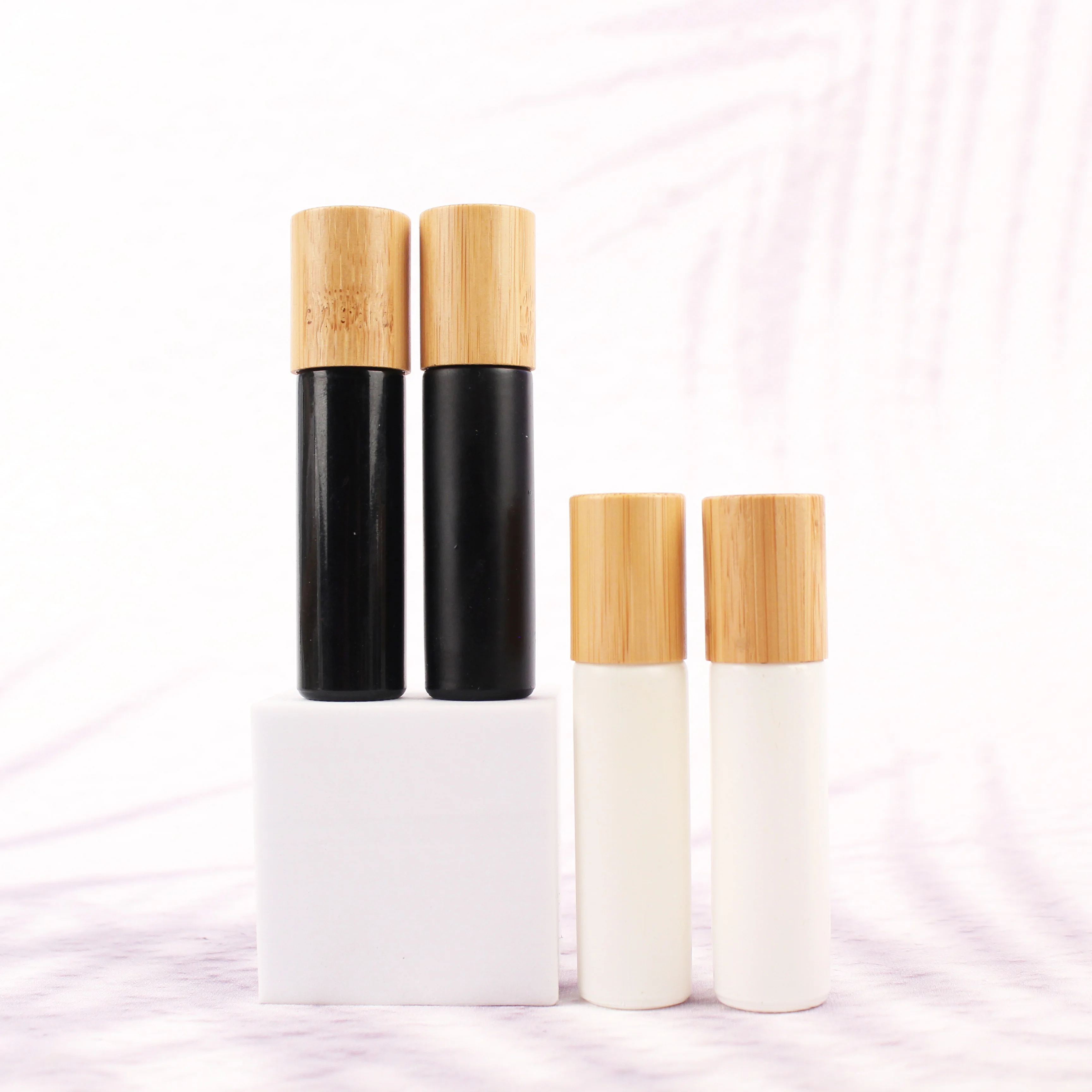 black 10 ml glass roller white bottle with bamboo top