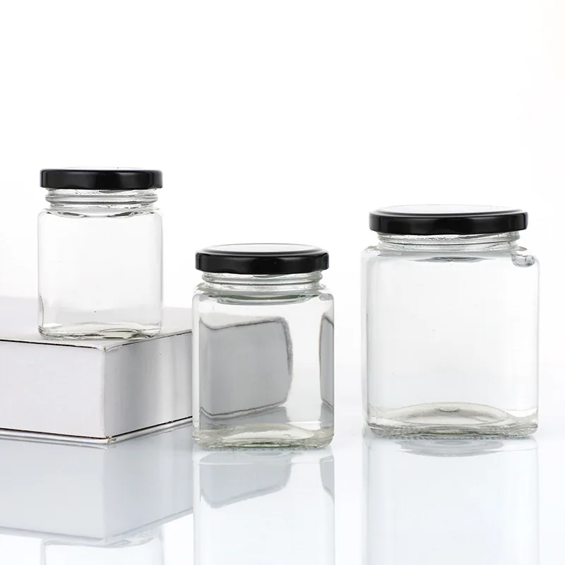 Hot sale High Quality Round Food Grade 100ml 200ml 250ml 500ml Storage Jam Sauce Canned Pickle Glass Honey Jar with Metal Lids