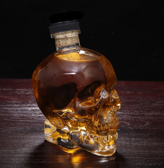 Factory direct sales skull shape clear glass Unique design 750ml glass whiskey vodka decanter glass bottle with caps