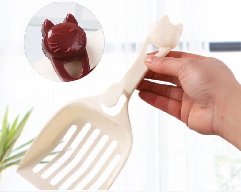 
Cute pet cleaning products include plastic cat litter spatulas with hooks 