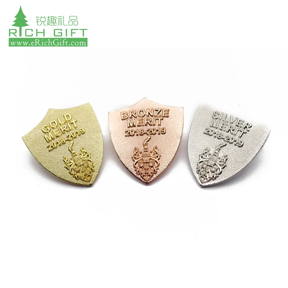 Top quality clothing small tiny stamping custom die cut plating gold silver copper embossed badge custom logo metal pin for sale