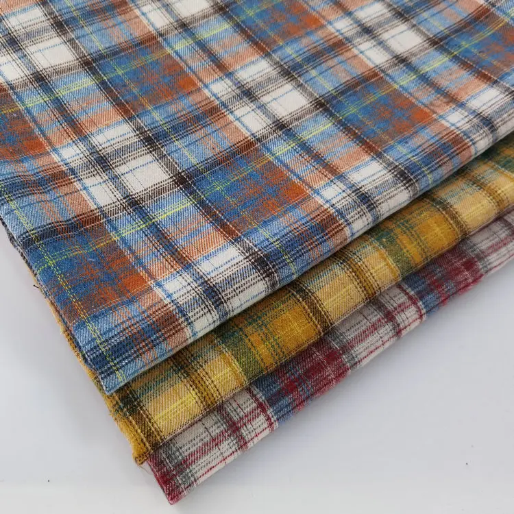 Polyester cotton yarn dyed tartan peach sanded flannel high quality plaid shirt fabric