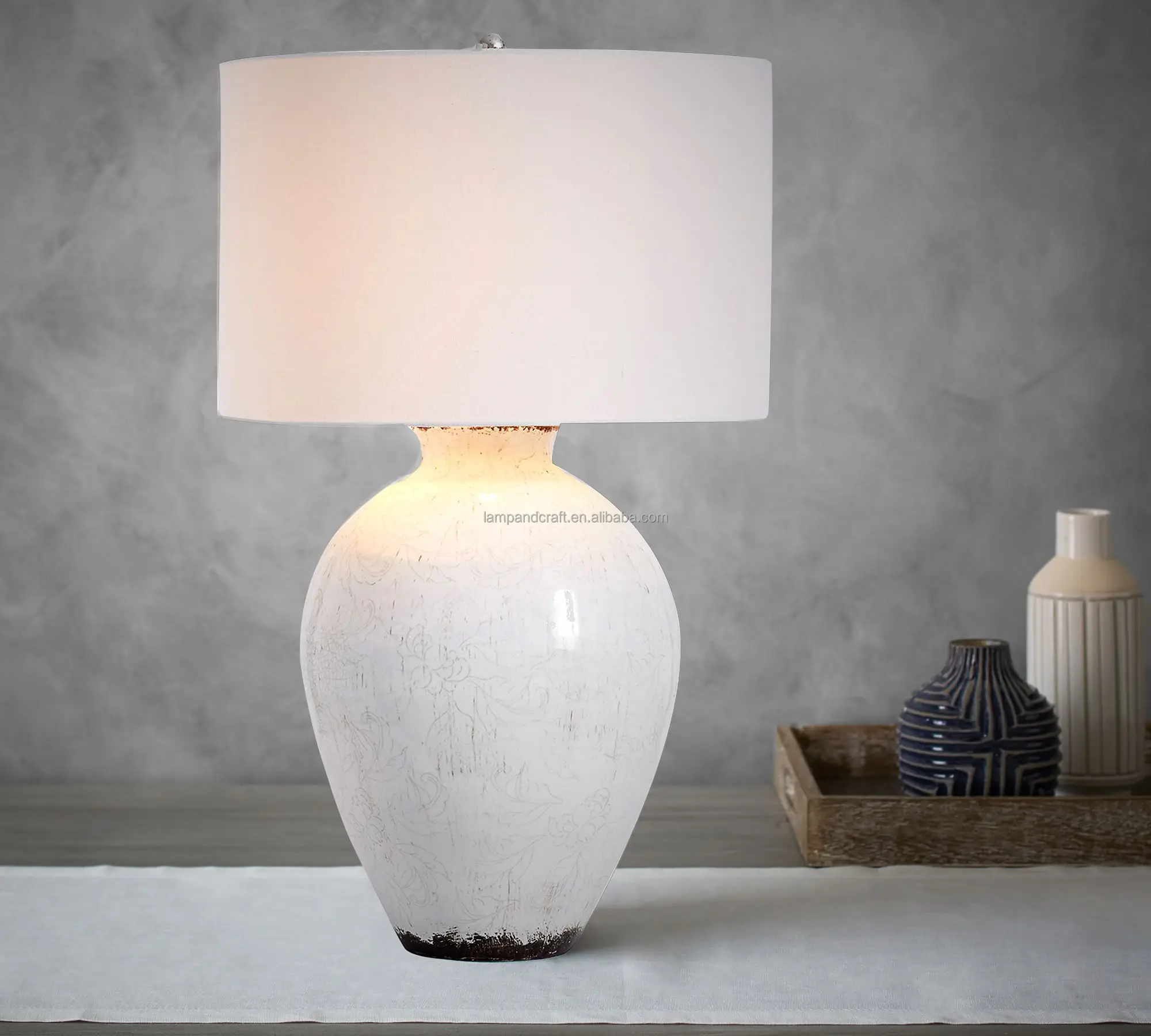 ceramic base table lamp Includes a cream linen drum shade