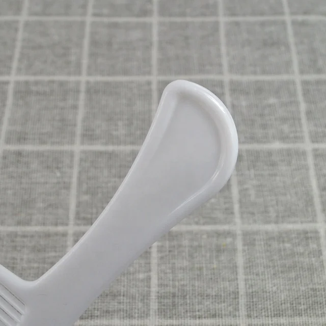 cheap white plastic comb for travel
