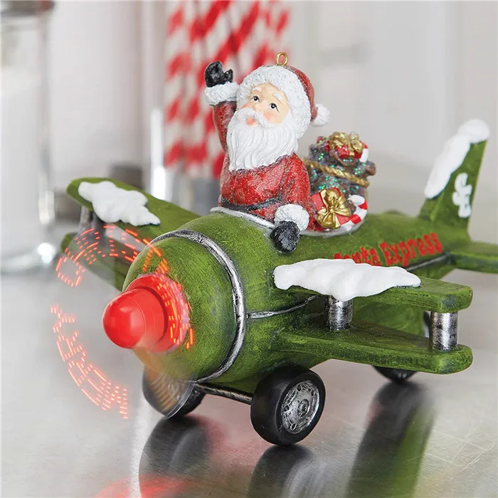 Polyresin/resin plane model Santa in Green Plane 9.5 x 6 Inch Resin Musical Animated Christmas Figurine