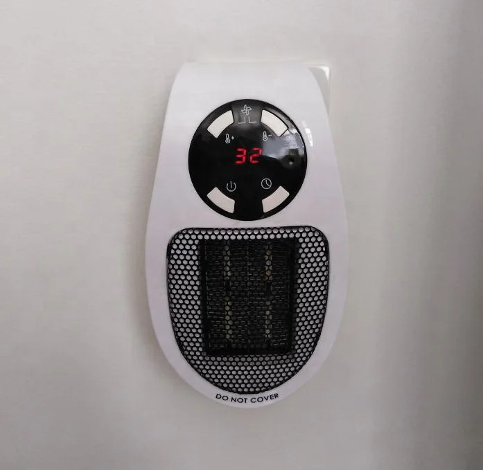 Worldwide Use Mini Portable Wall Outlet Electric Heater for Home