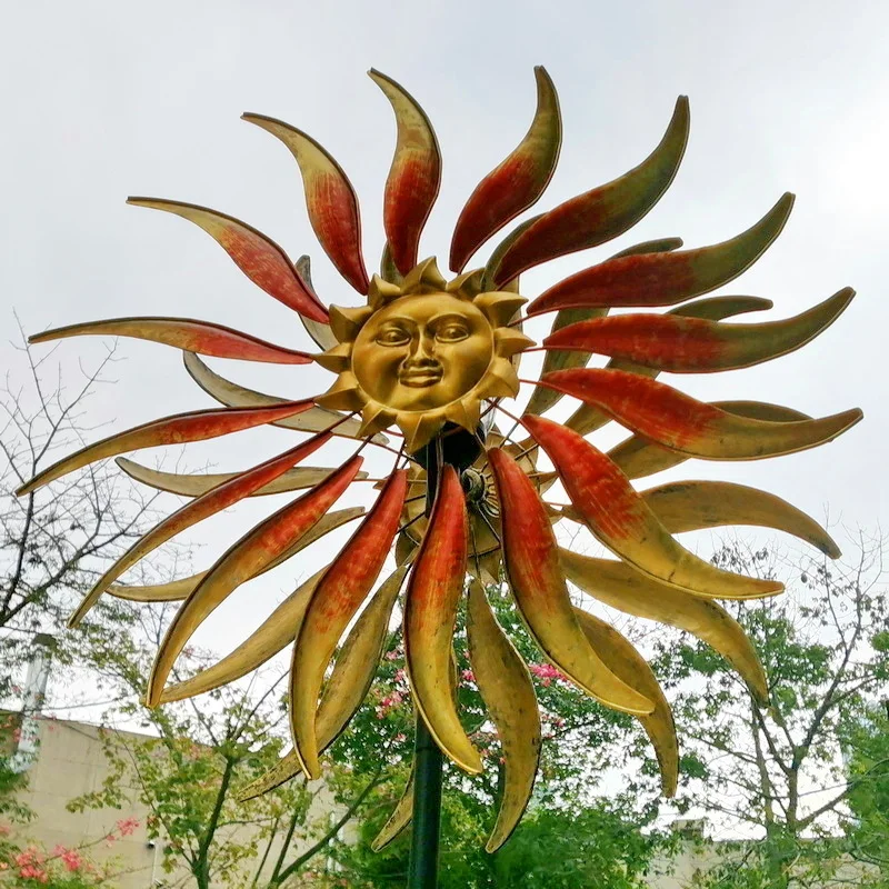 yard art metal sun face colour changing solar wind spinner spiral light