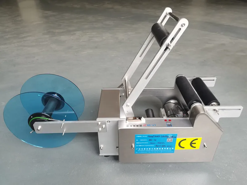 Semi automatic manual small round can water bottle labeling machine