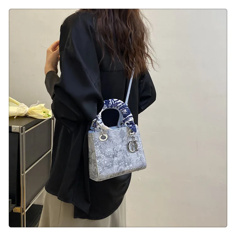 High quality designer floral texture ribbon handbag fashionable daily outfit women shoulder crossbody bag elegant charming