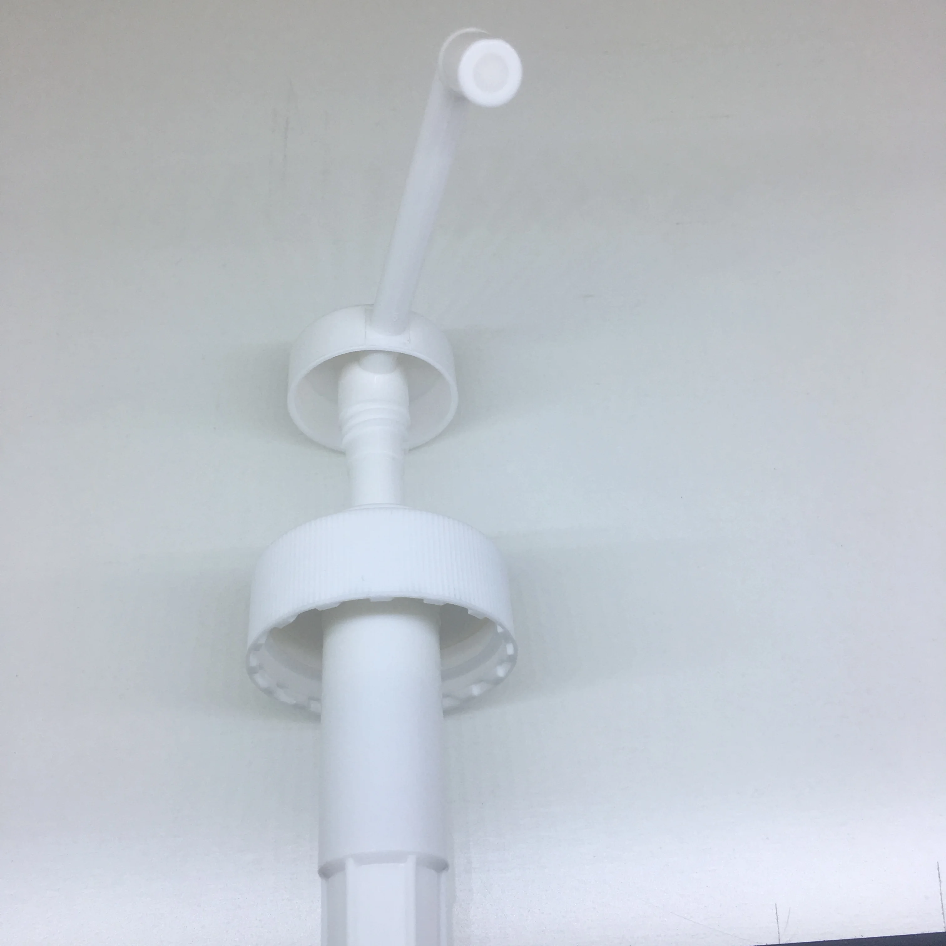 White PP 38-400 sanitizer sprayer dispensing pump with 11 inch dip tube for 1 gallon bottle