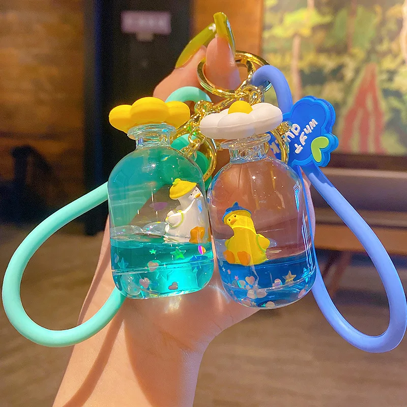 Hecion Acrylic Rotating Spinning Flower Keychain Gift Creative Floating Duck Quicksand Liquid Car Key Chain